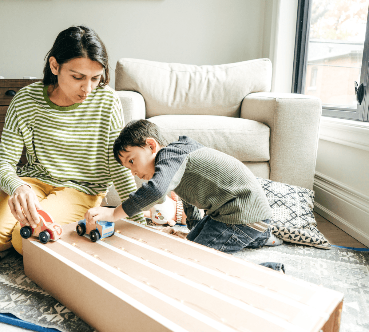 Woman playing with child