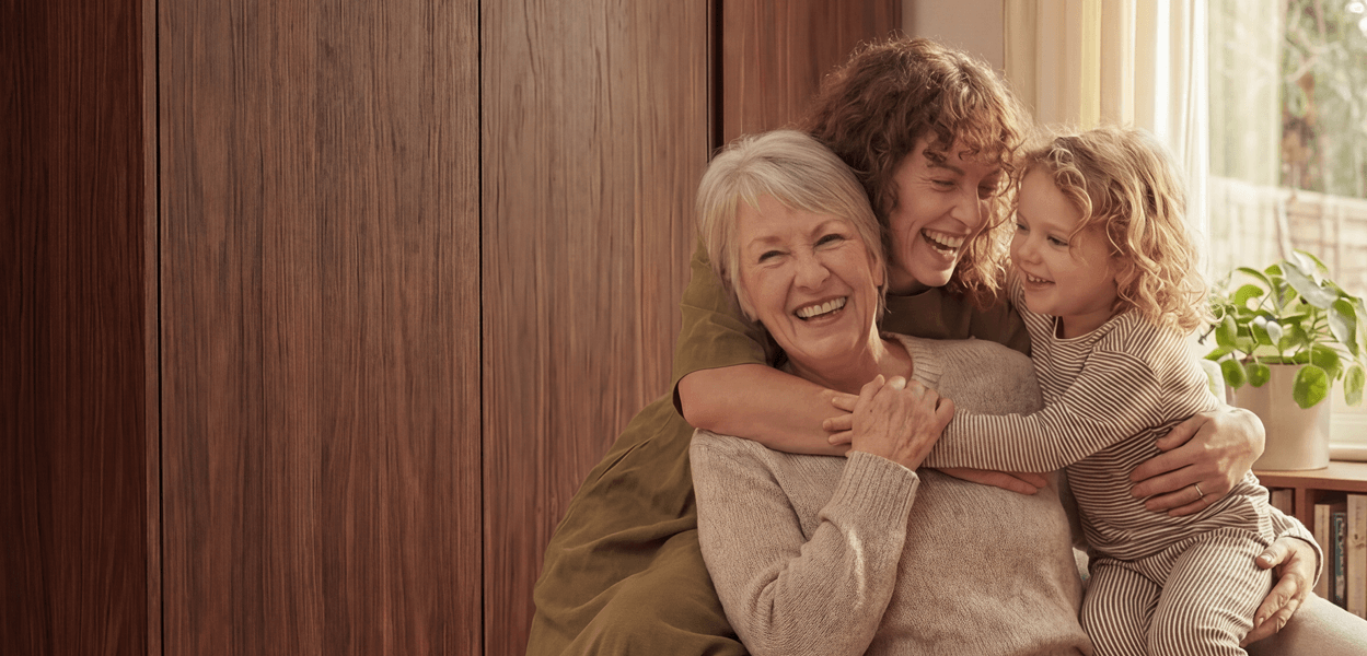 Multi-generational family: Grandma, Mother, Daughter embracing