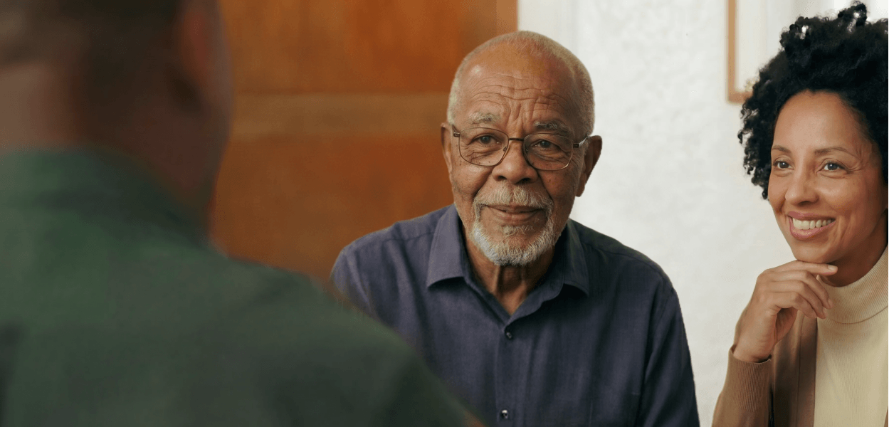 father and daughter consulting financial advisor