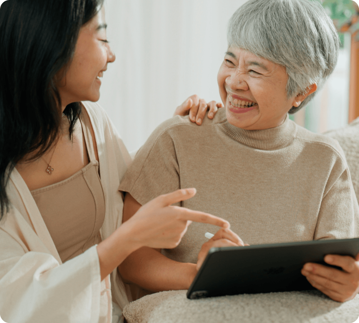 A media interface featuring a video player. The main video is titled "Property in your Will," with a still image of a woman speaking. Below it, there is a section labeled "More to discover" with three additional video thumbnails: "Healthcare proxies", "Executors 101", and "Children & guardians", each featuring different individuals.