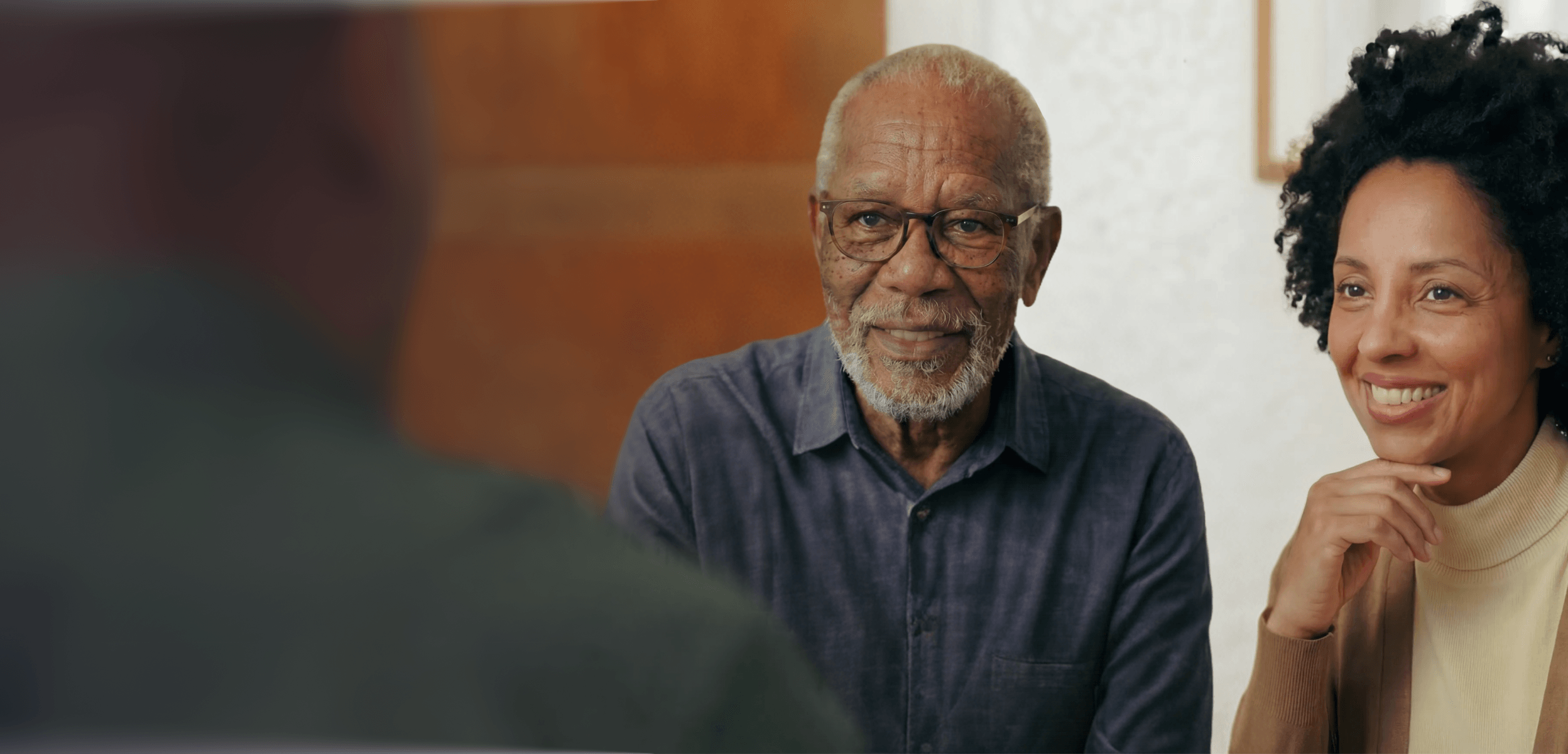 father and daughter consulting financial advisor