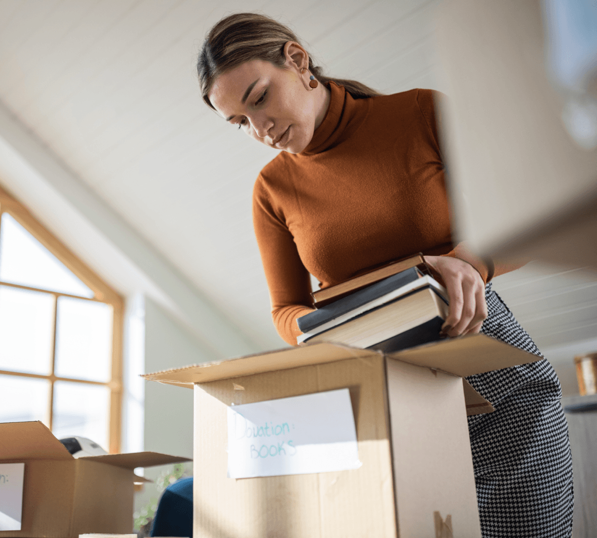 Woman packing a box